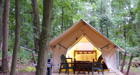 Airstreams, cabooses, and teepees, oh my! Here’s our guide to glamping KOA-style