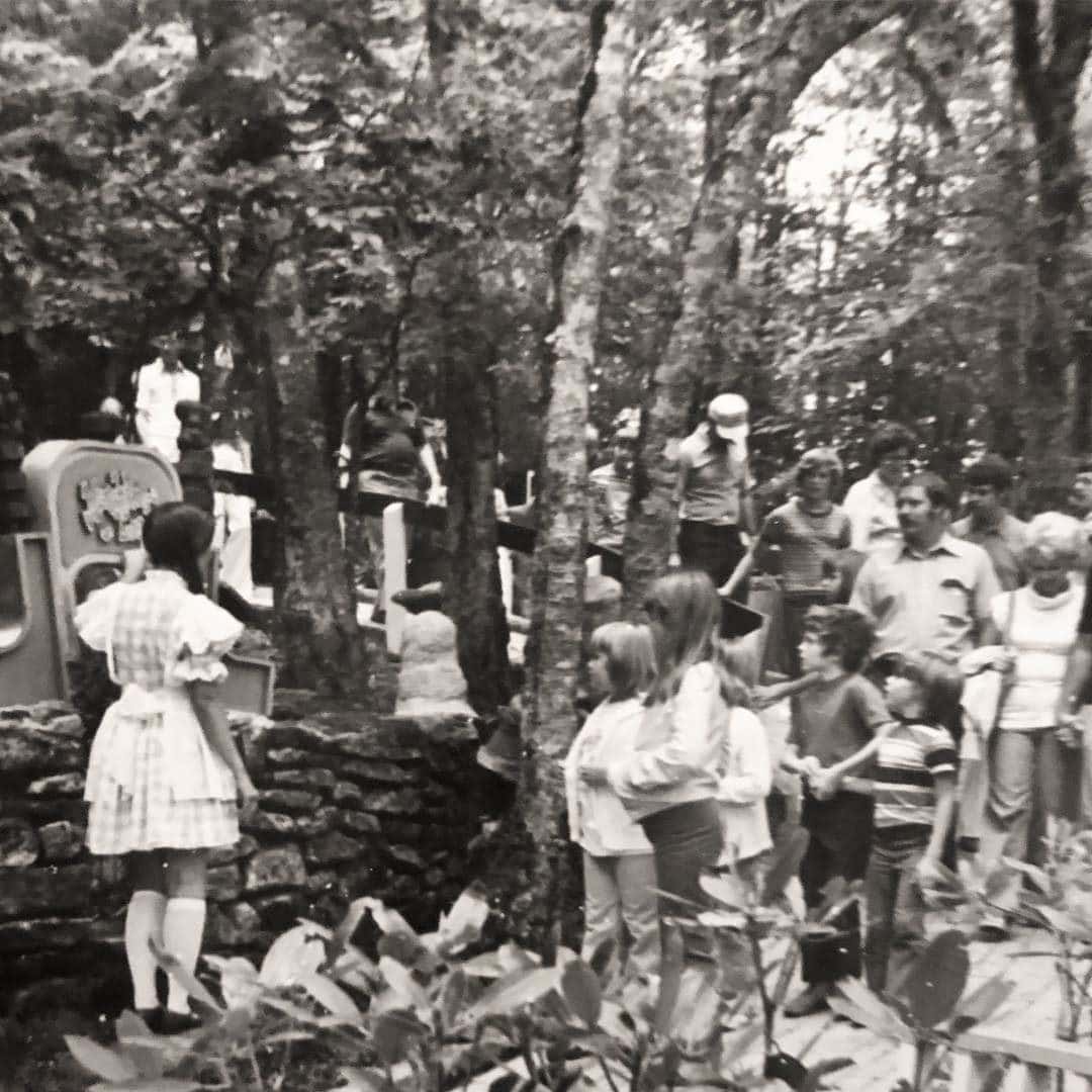 Dorothy leads guests to Munchkinland after making it through the twister in 1976.