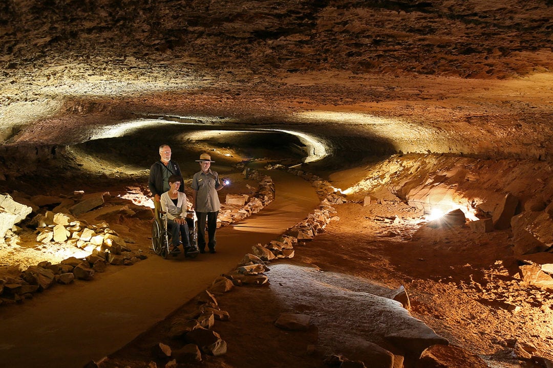 An woman in a wheelchair takes a tour of Mammoth Cave