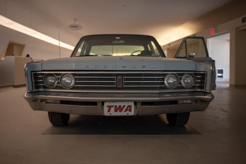 vintage car with TWA license plate