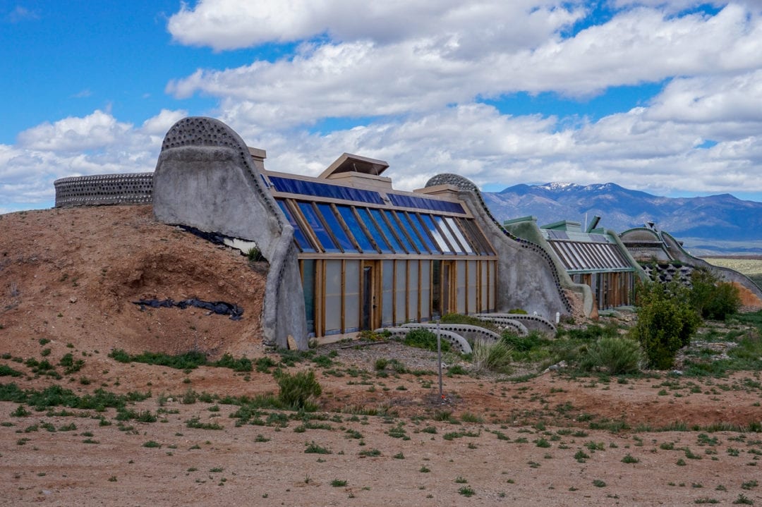 The earthships have windows facing south. 