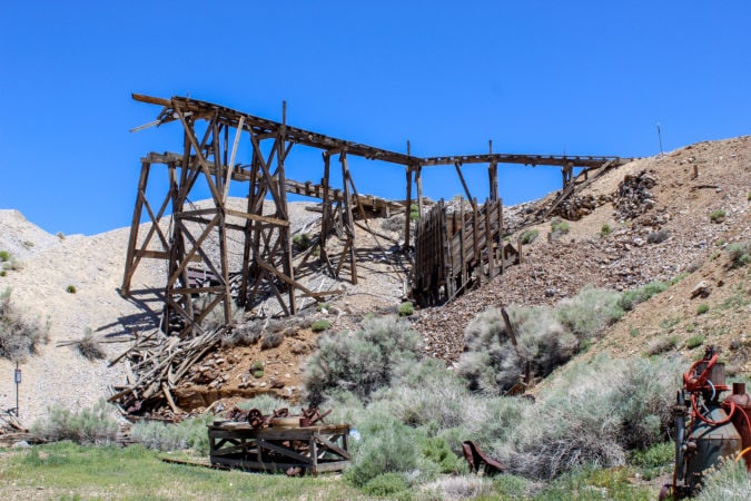 An old mining hopper barely stands at the Cerro Gordo ghost town 