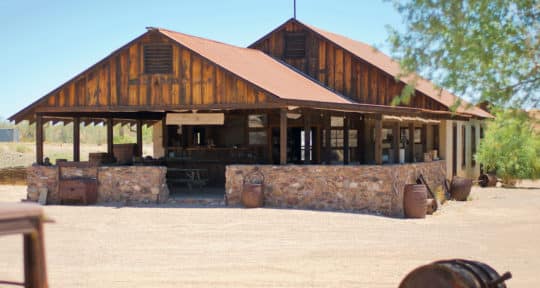 In Vulture City—a once-forgotten ghost town—haunted brothels and secret hideaways are being brought back to life