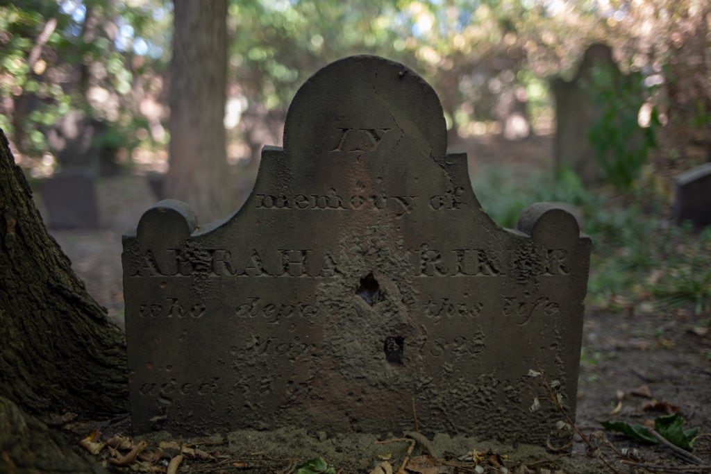 Most of the inscriptions on the headstones have worn away