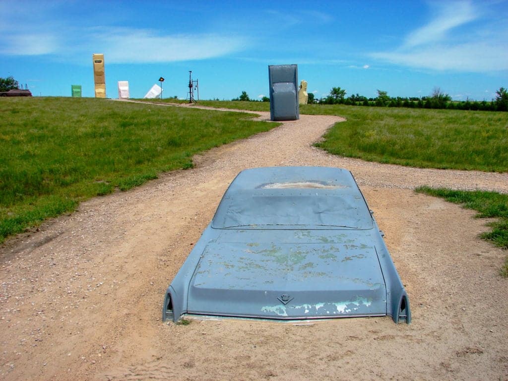 A buried Cadillac on site.
