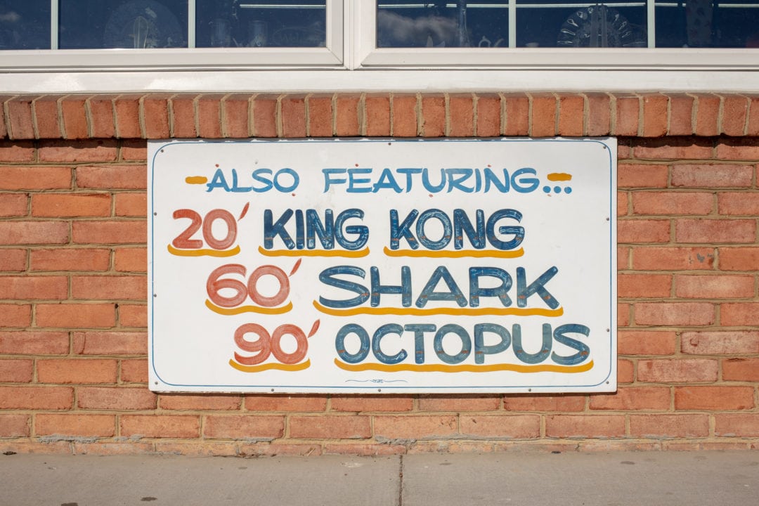 A handpainted sign at the gift shop.