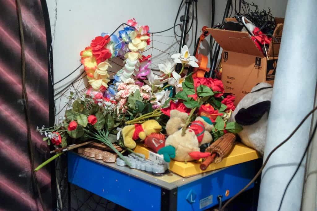 A pile of photo props, some of which Tom has made by hand.
