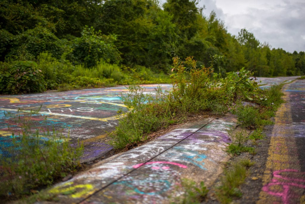 A broken section of road.