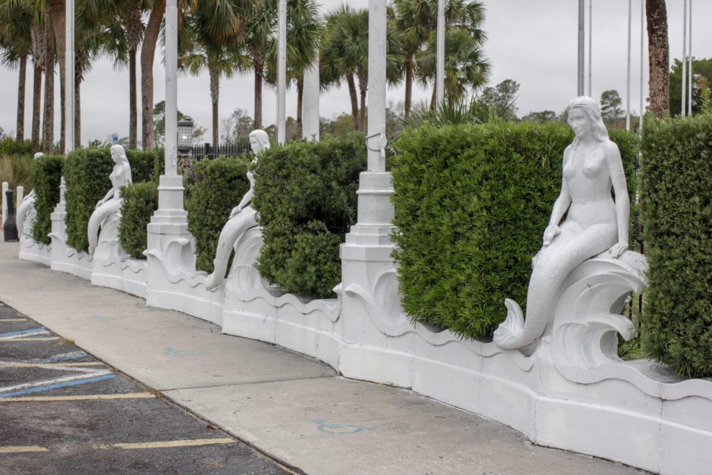 Mermaids watch over the parking lot.