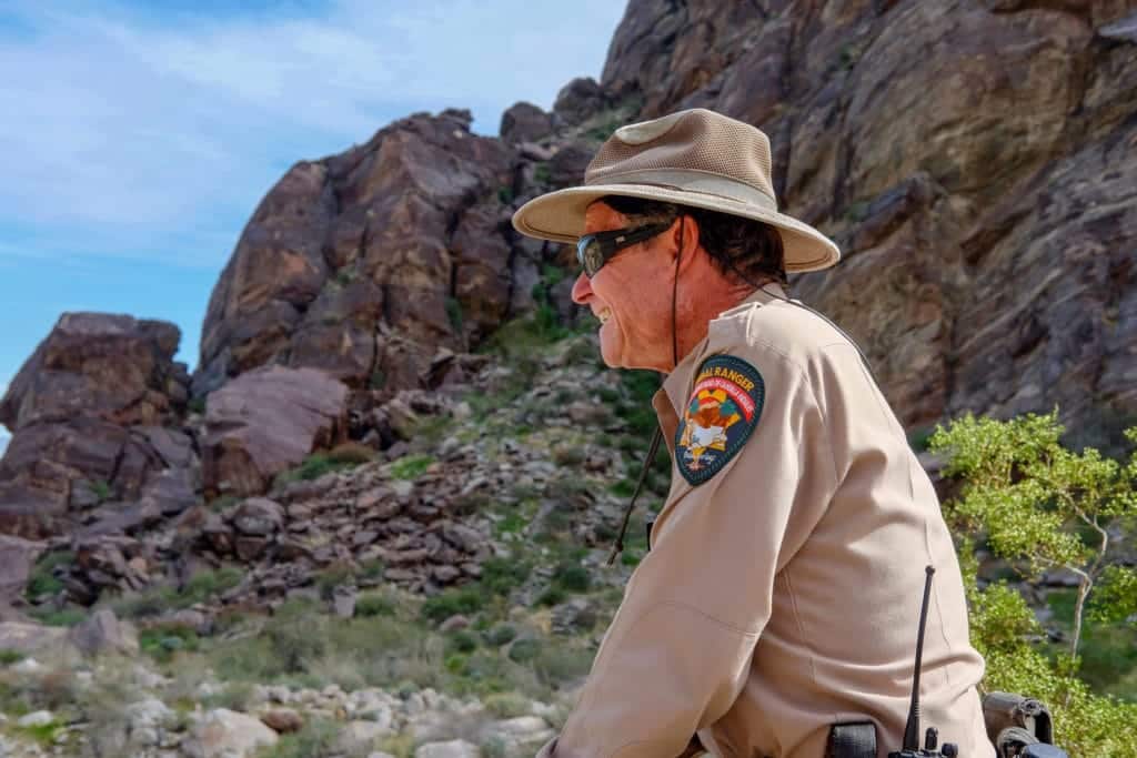 Hepburn stops to survey the canyon.