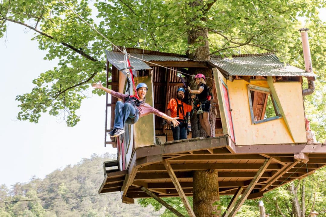 Ziplining from a treehouse.