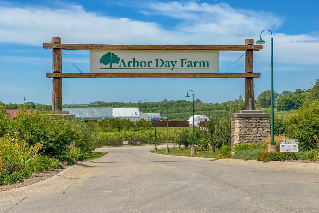 The entrance sign for Arbor Day Farm.