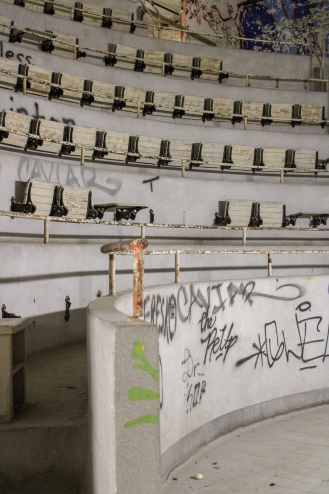 The surgical theater in its current, dilapidated state, covered in grafitti.