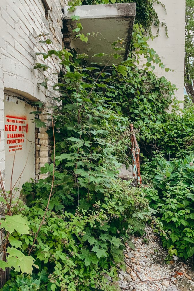 A sign outside the abandoned cottage reads: "Keep out. Hazardous conditions."