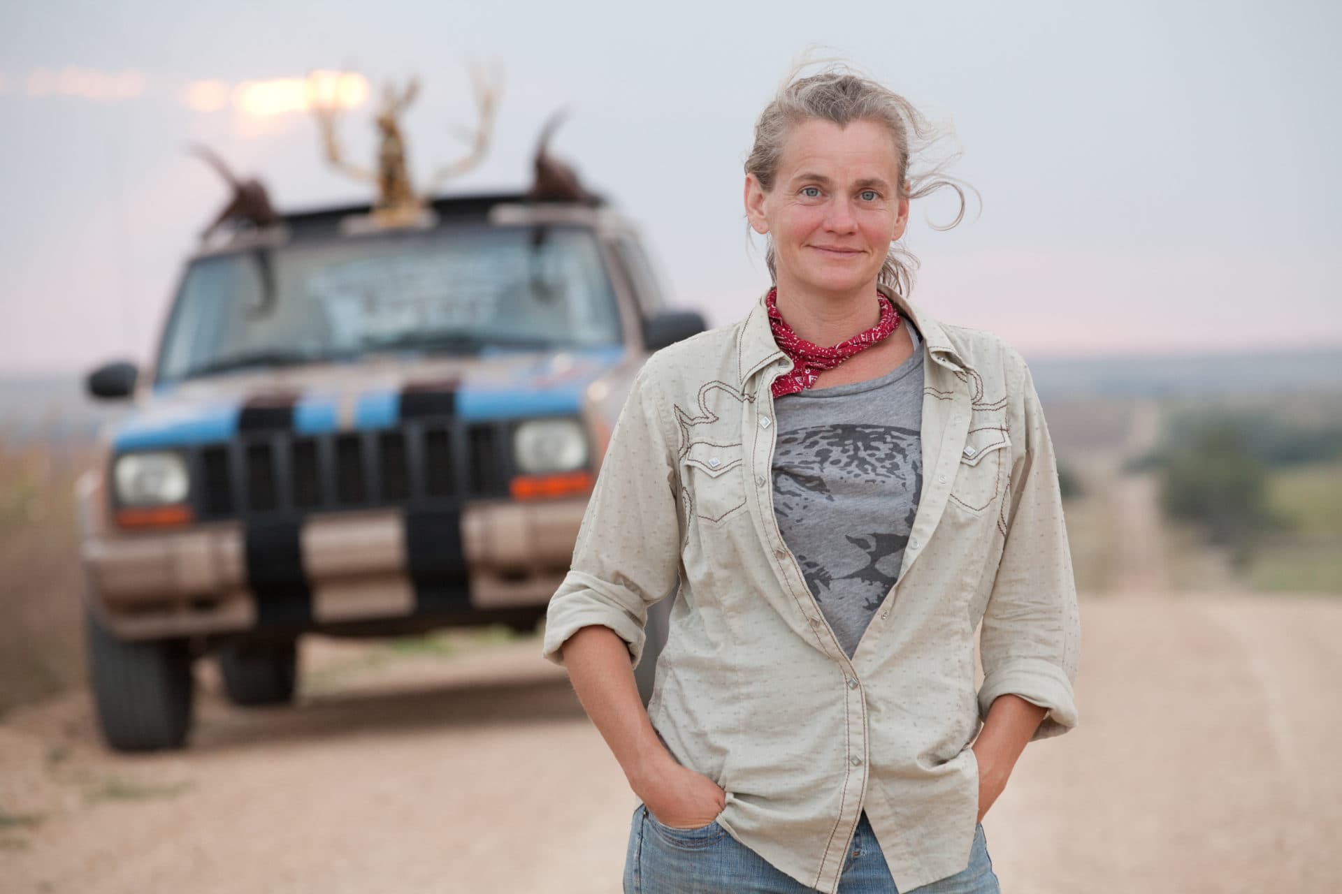Erika Nelson and one of her mobile museums, the "Jeepalope."