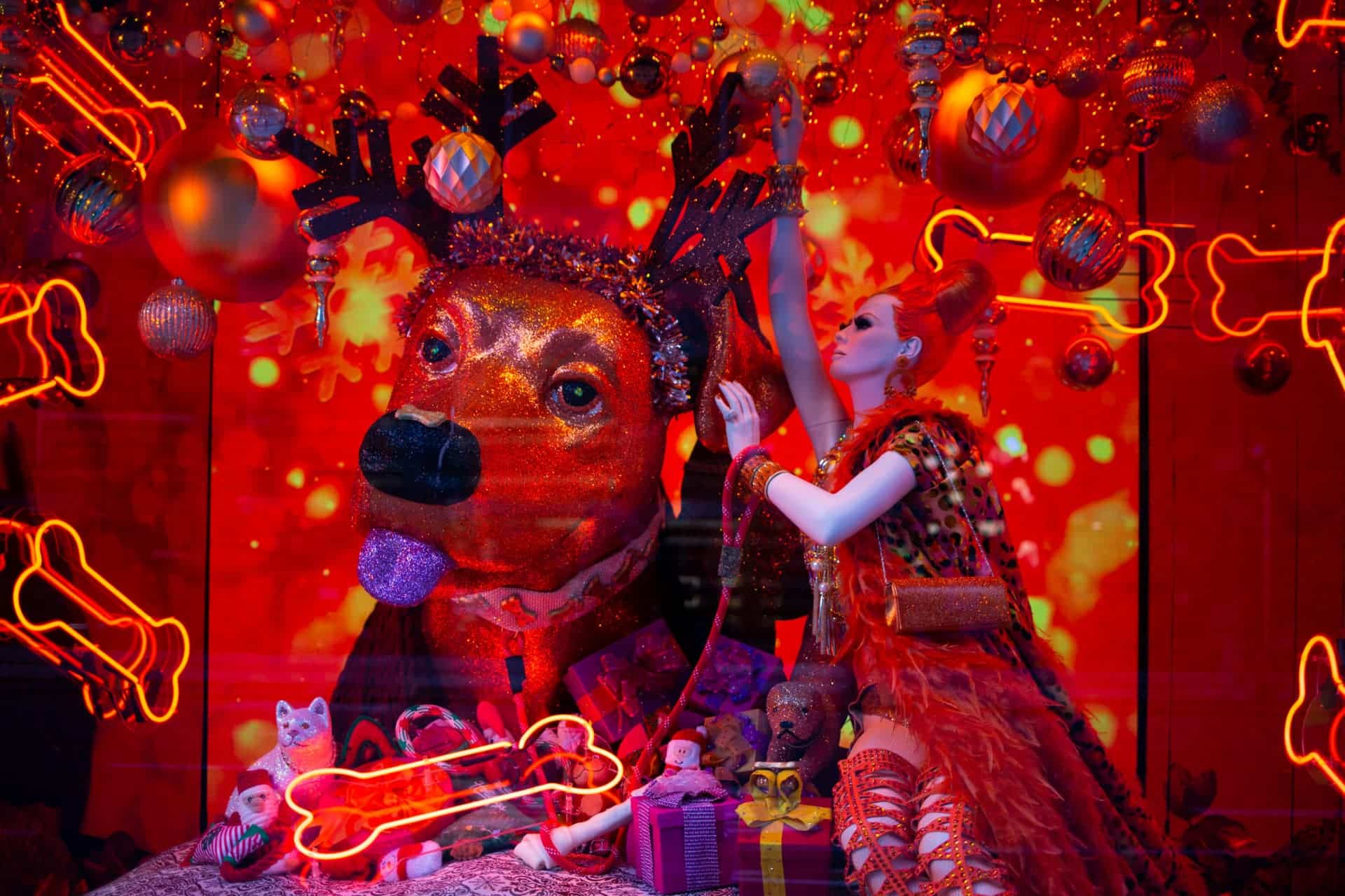 An oversized, glittery dog gets festive in one of the color-coordinated Bloomingdale’s displays.