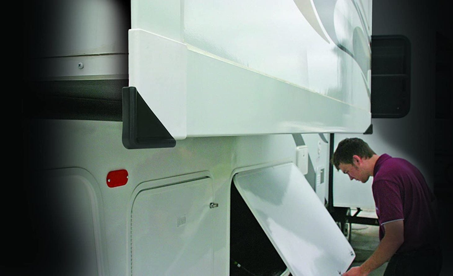 Person accessing RV storage with slide out 