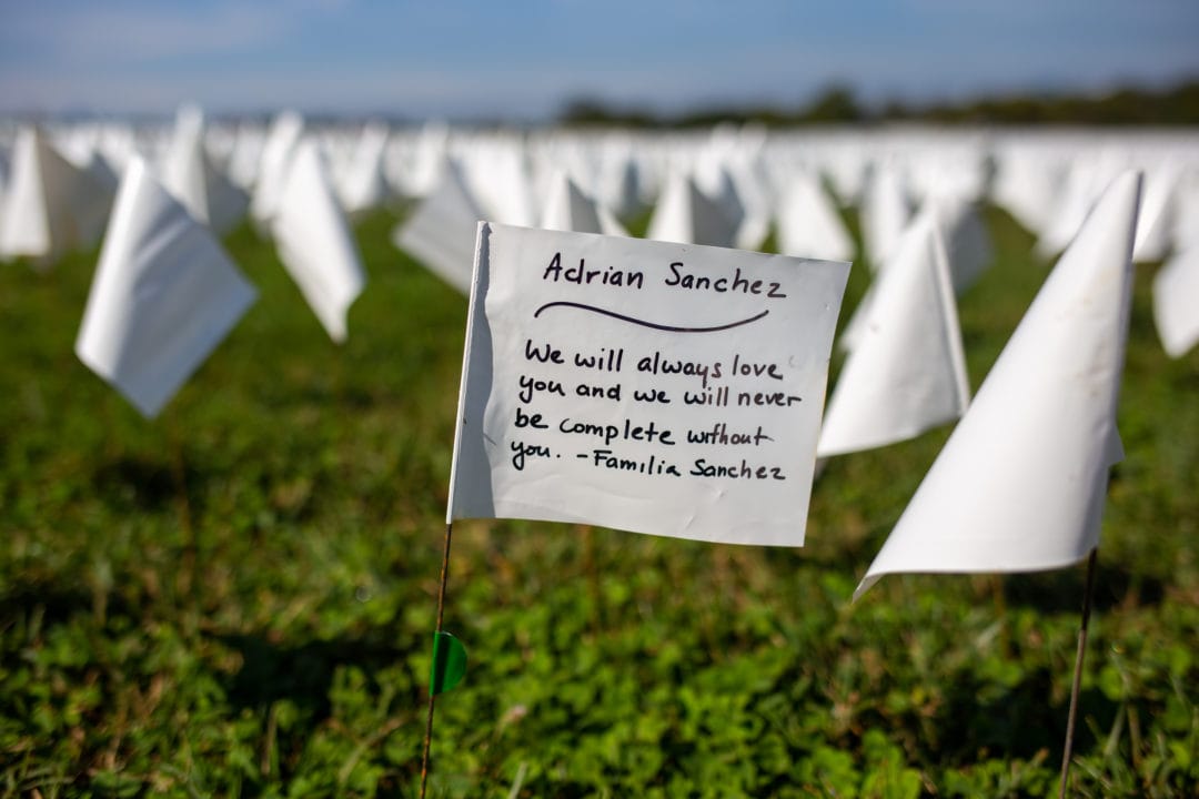 a personalized white flag reads "we will always love you and we will never be complete without you"