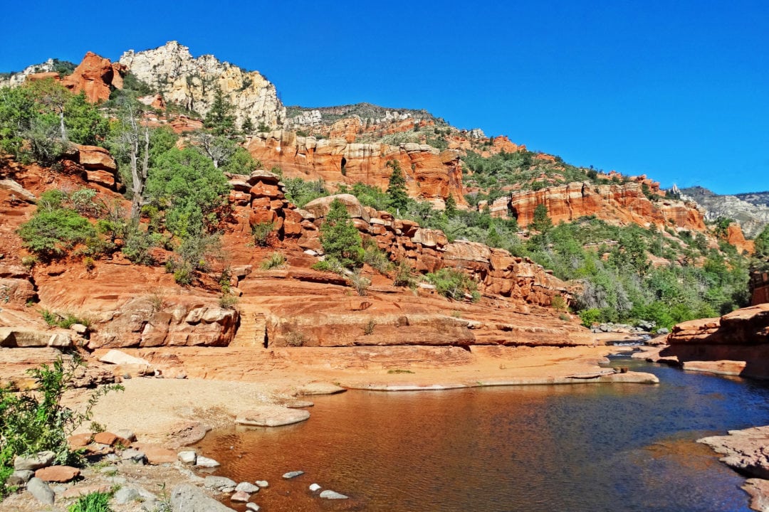 red rocks and water