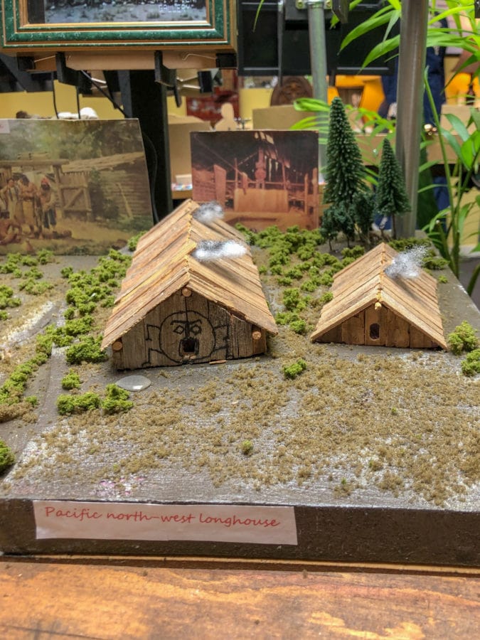a diorama including tiny wooden houses