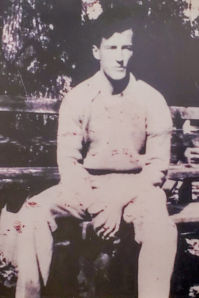 a black and white photo of walter anderson seated in 1933