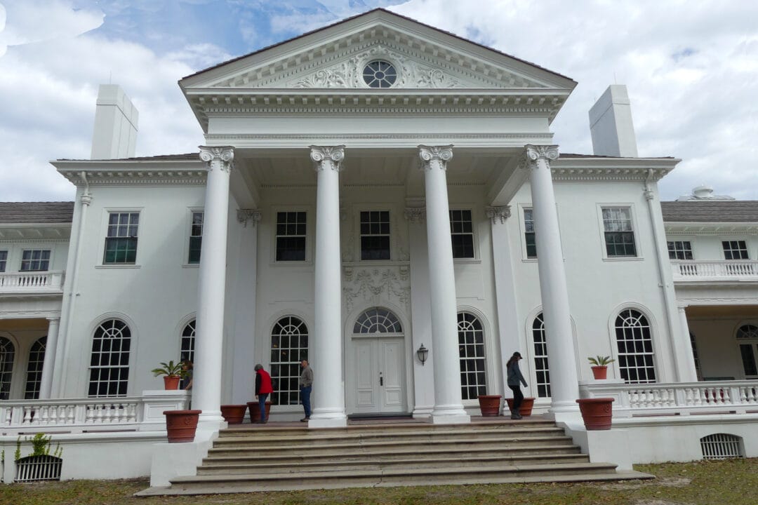 a classical white two story mansion