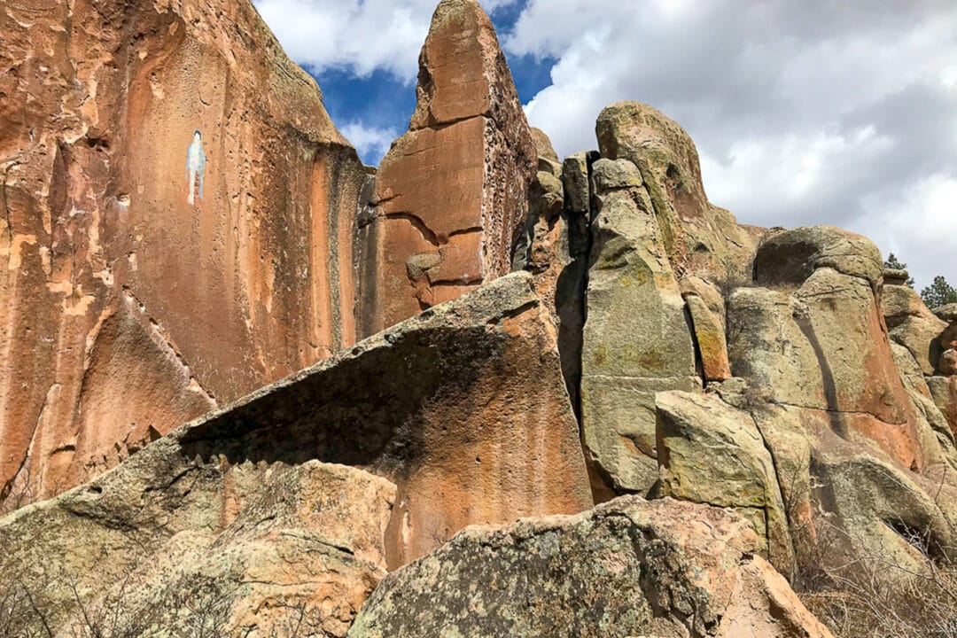 close up on ragged rock formations under a cloudy sky