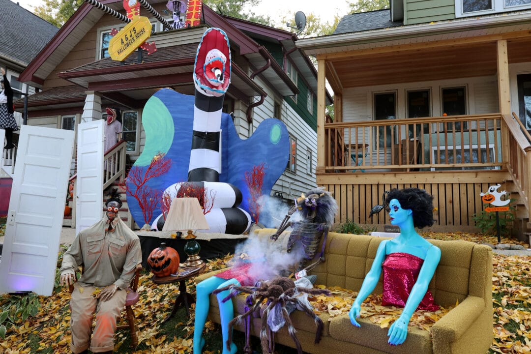 a halloween yard display with characters from beetlejuice