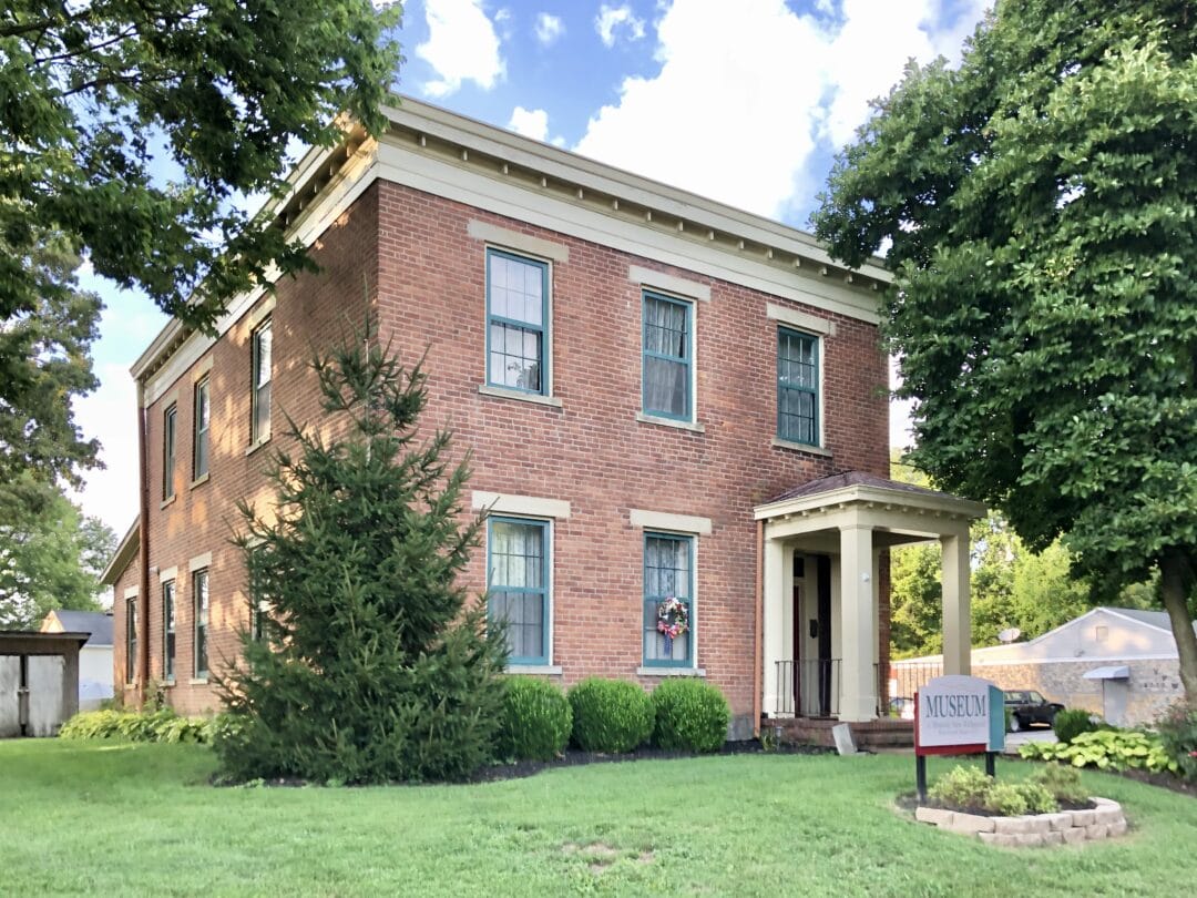 A 2-story red brick building.