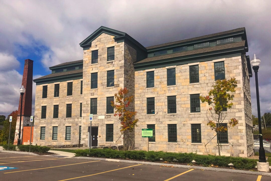 The National Women's Hall of Fame is a wide building with many windows.