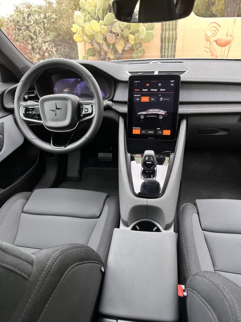 The front seats, steering wheel, and navigation system in the Polestar electric car